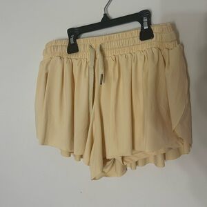 Tan flowy athletic shorts